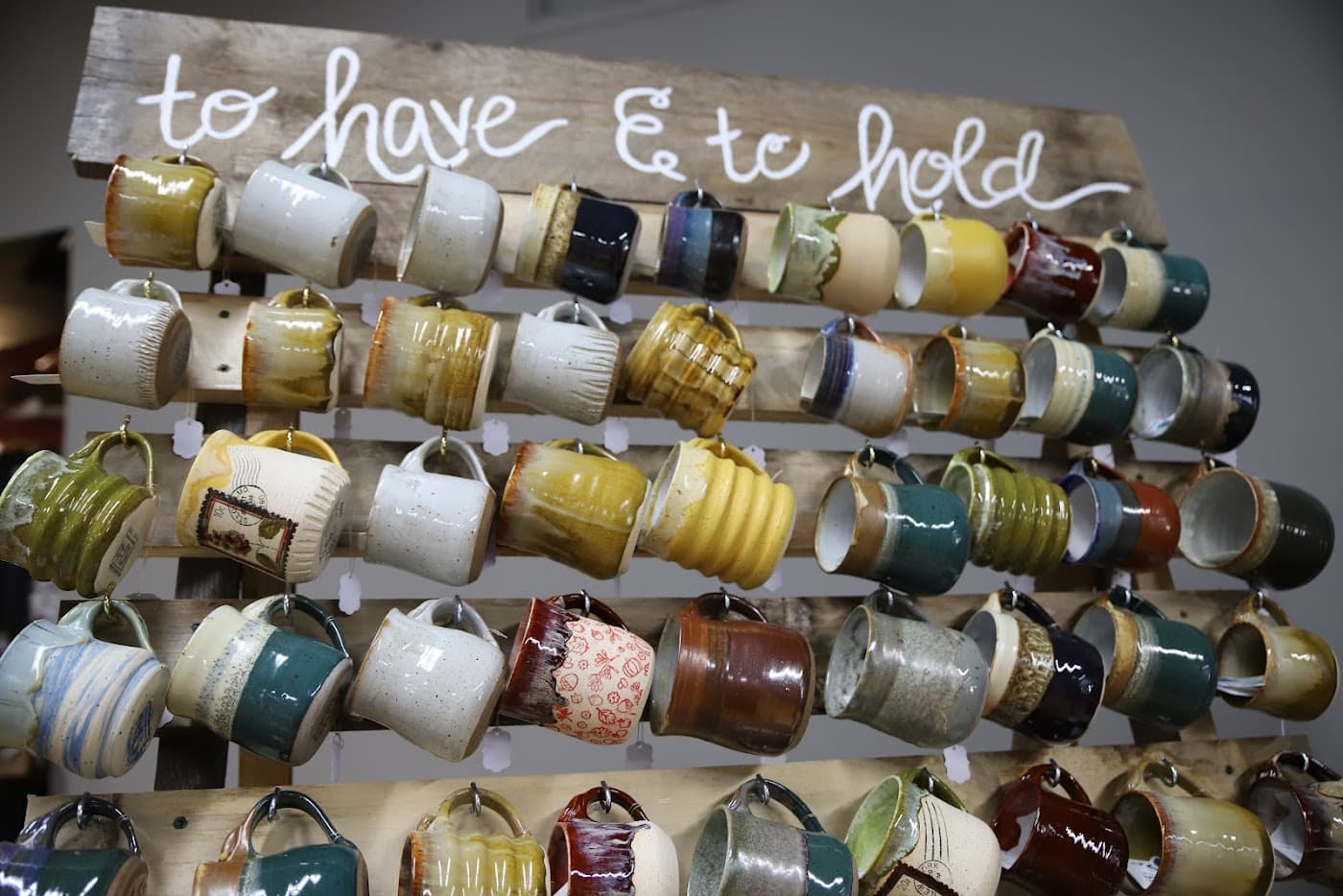 Handmade mug wall from Avery's wedding, lettered to have and to hold