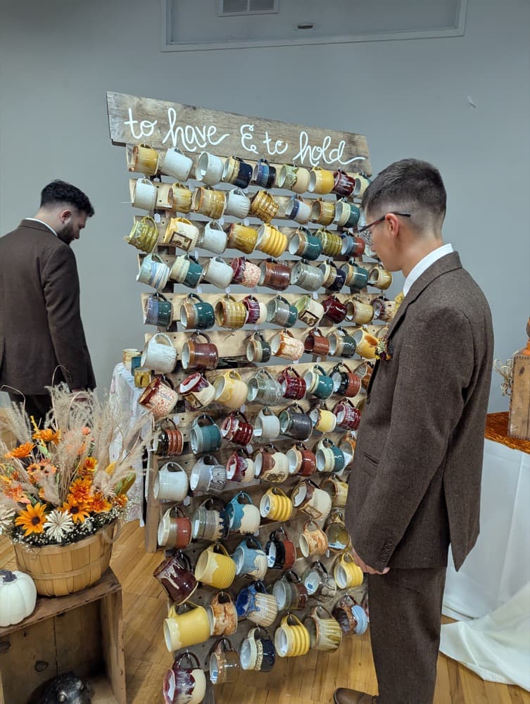 Wedding mug wall as a guest browses